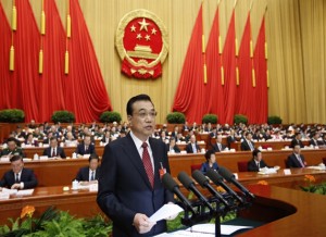 Chinese Premier Li Keqiang delivers the government work report to nearly 3,000 legislators in the Great Hall of the People on March 5, 2016. 