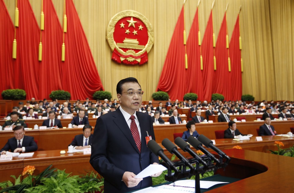 Premier Li Keqiang is delivering the annual government work report to nearly 3,000 legislators in the Great Hall of the People. 