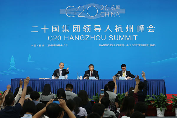 Yi Gang, vice-governor of People's Bank of China, answers questions at a press conference on Sept. 2, 2016, prior to the G20 Leaders Summit to be held in Hangzhou, Zhejiang Province. 